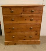 A pine two over three chest of drawers (H99cm W93cm D46cm)