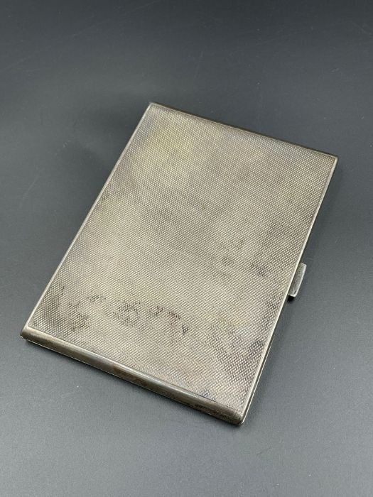 A silver cigarette case by William Suckling Ltd, hallmarked for Birmingham 1946.