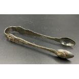 A pair of Georgian sugar tongs, hallmarked for London 1824 by William Chawner II