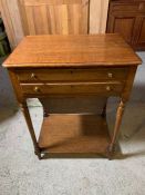 An Edwardian oak two drawers work table with fitted interior