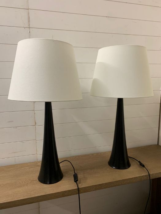 A pair of contemporary Aerin signature lamps
