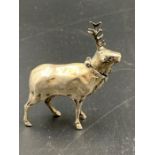 A silver possibly vesta, snuff box, pin older or similar in the form of a stag by Eugen Henry Posen