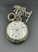 A Freeman & Co silver pocket watch and silver Albert chain