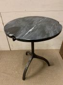 A Eichholtz cortina side table. Marble side table on hammered gunmetal base (H58cm Dia46cm)