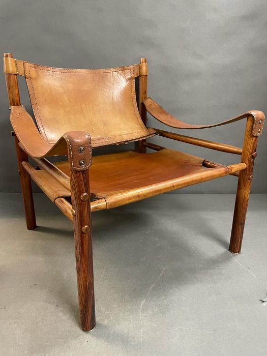 A Sirocco Chair in brown leather