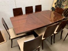 A hi-gloss contemporary dining table and eight chairs by ALF group with one centre leaf