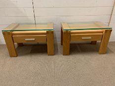 Two glass top oak bedsides (H41cm W62cm D35cm)