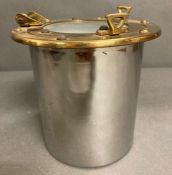 A Nautical themed ice bucket in the style of a porthole 16 cm H