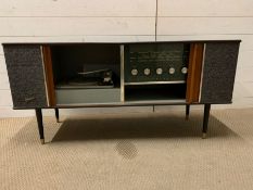 A Marconi Mid Century teak radiogram (H58cm W119cm D38cm)