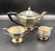 A three piece silver (approx 580g) tea set hallmarked for 1895 London Thomas Bradbury & Sons