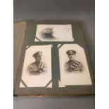 An amazing album of historical photographs postcards and silk postcard envelope/for love ones, war