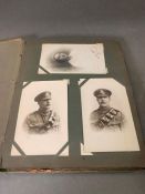 An amazing album of historical photographs postcards and silk postcard envelope/for love ones, war