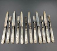 A six setting silver and mother of pearl dessert knife and fork set by George Hardisty, hallmarked