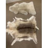 A Reindeer Hide and Sheepskin rug