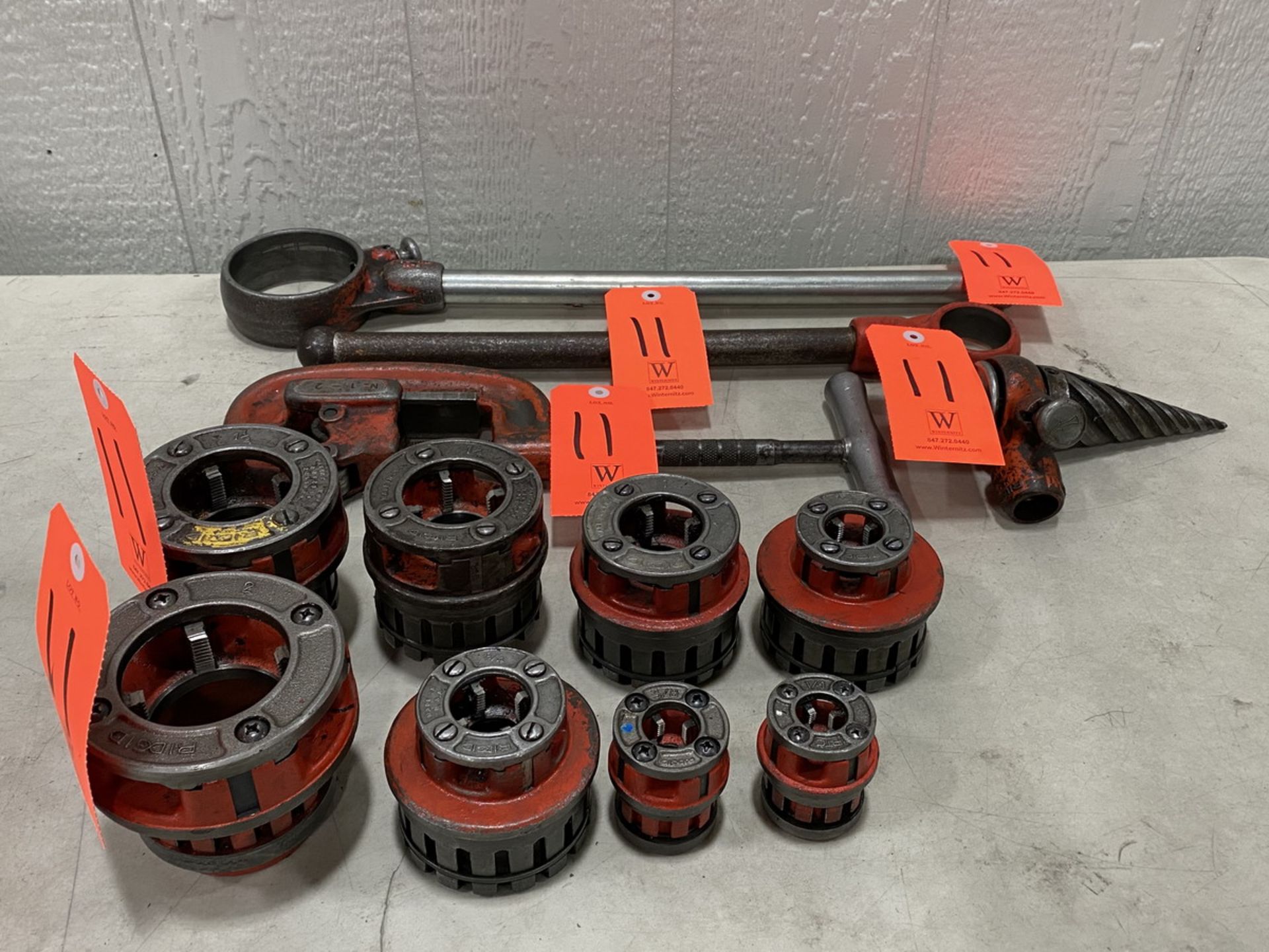 Lot - Ridgid Exposed Ratchet Threader; to Include: (2) Ratchet Handles, (1) Pipe Reamer, (1) Pipe