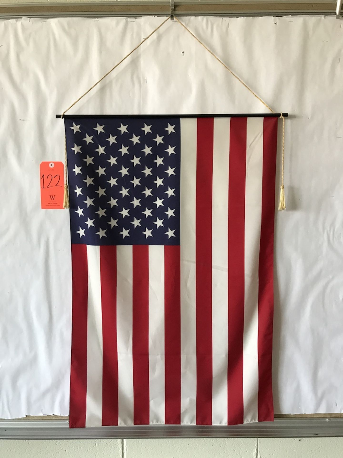 Lot - (1) American Flag (1) Wall Clock (1) Elecric Pencil Sharpener (Room 104)