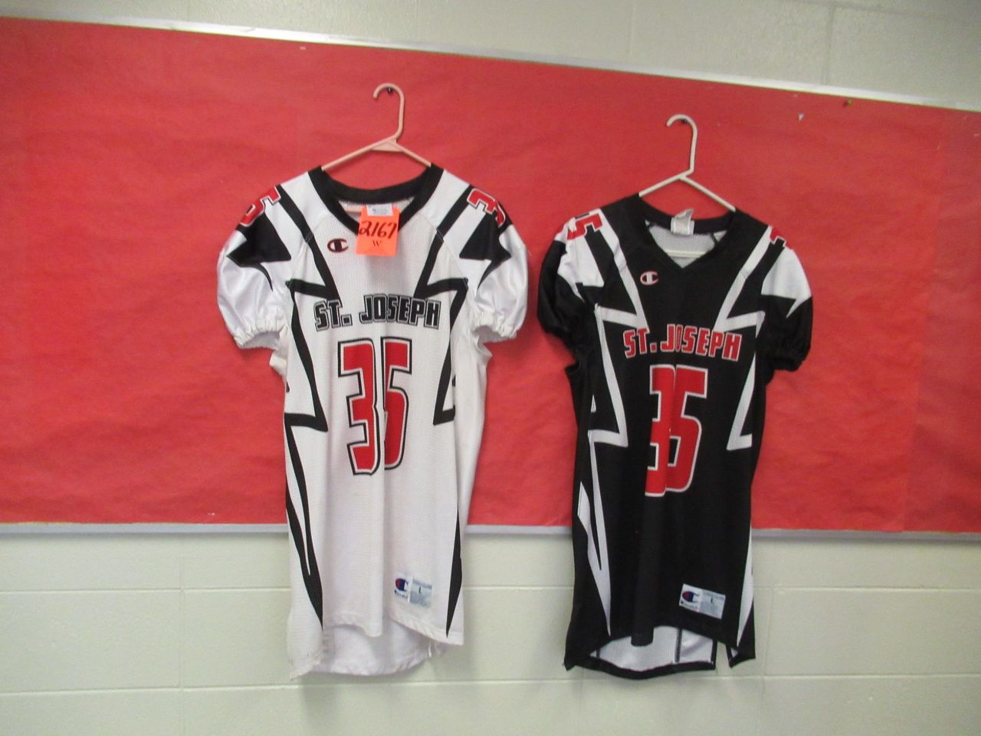 Lot - (2) #35 Champion L St Joseph Black & White Football Jersey (Room 110)