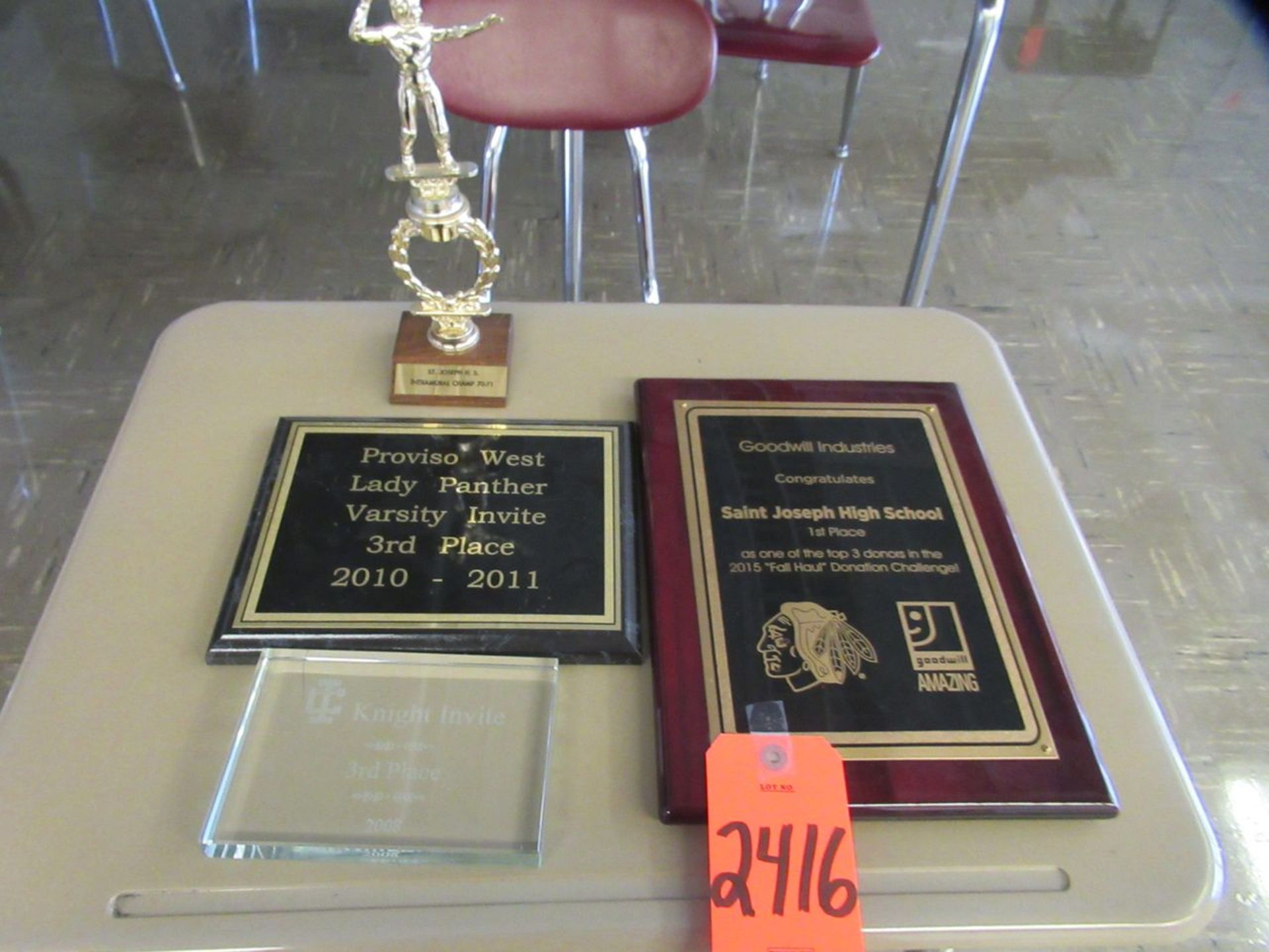 Lot - (4) Track and Field Plaques and Trophies (Room 301)