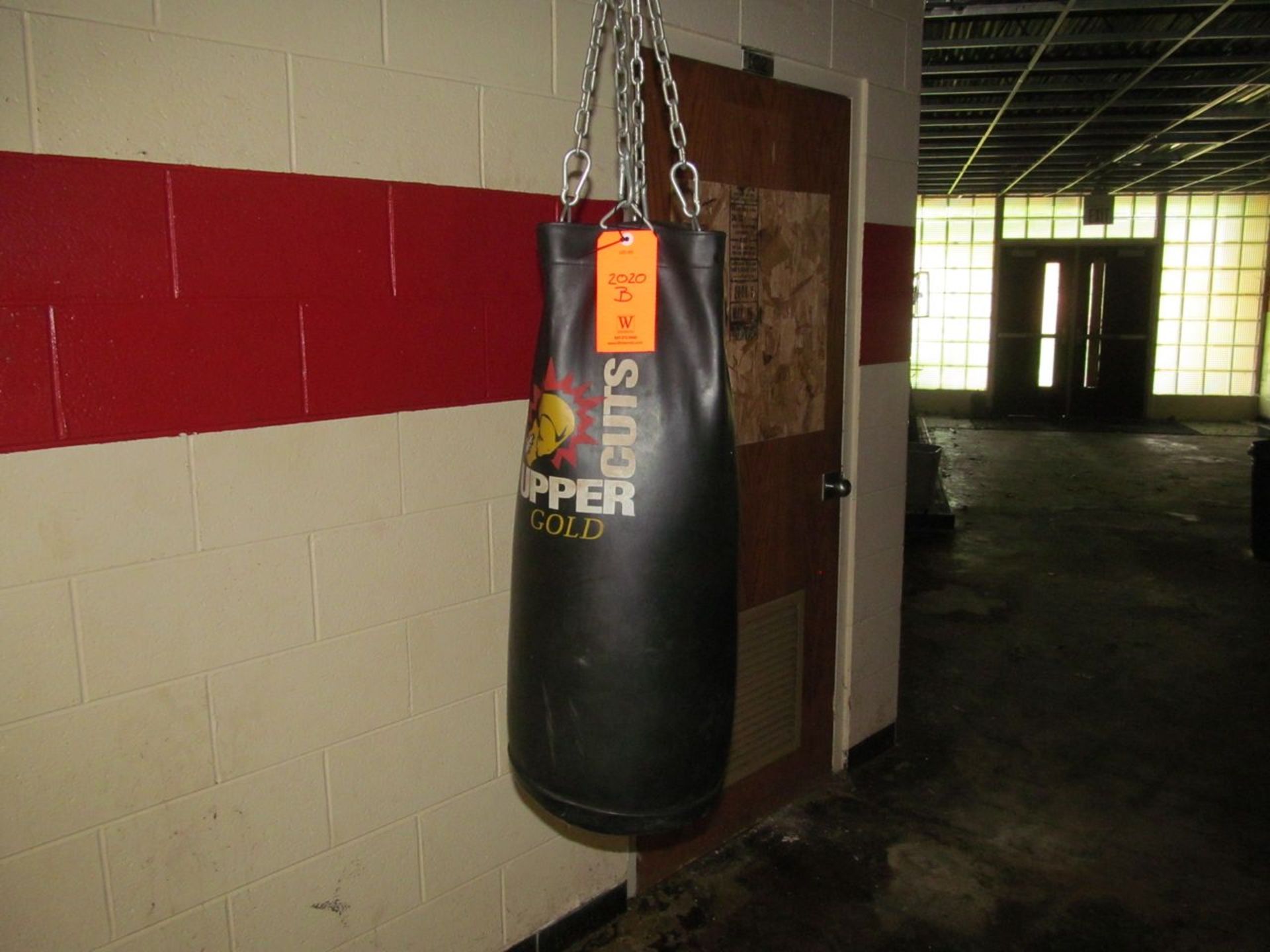 Upper Cuts Gold Punching Bag (Outside Weight Room 105)