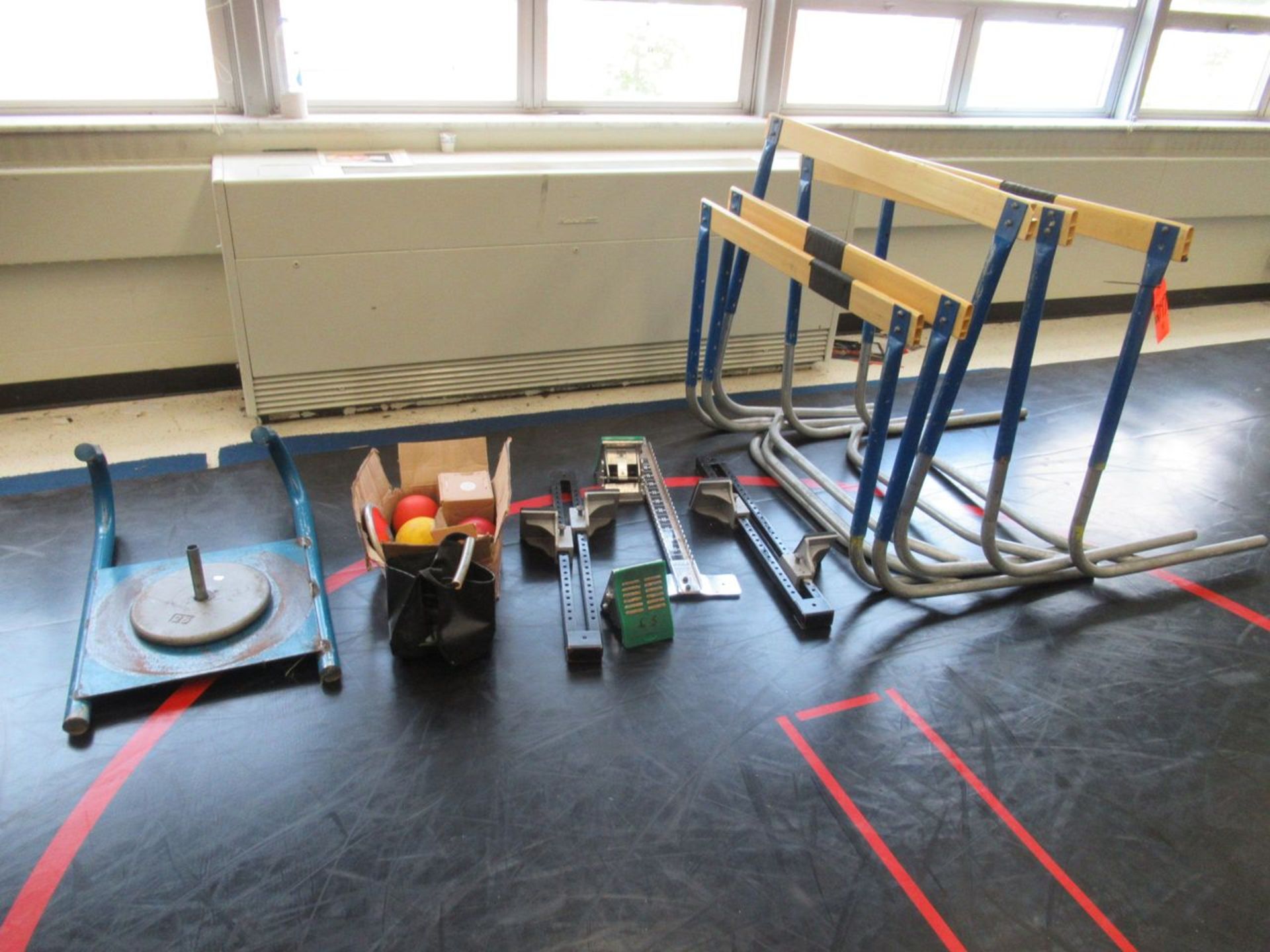 Lot - (5) Hurdles, (3) Starting Blocks, Weighed Balls and Disc (Room 110)