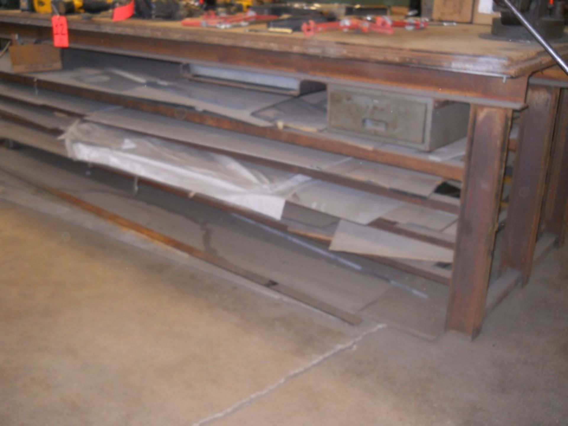 Lot - 12 ft. (approx.) Steel Inventory Table; with Materials