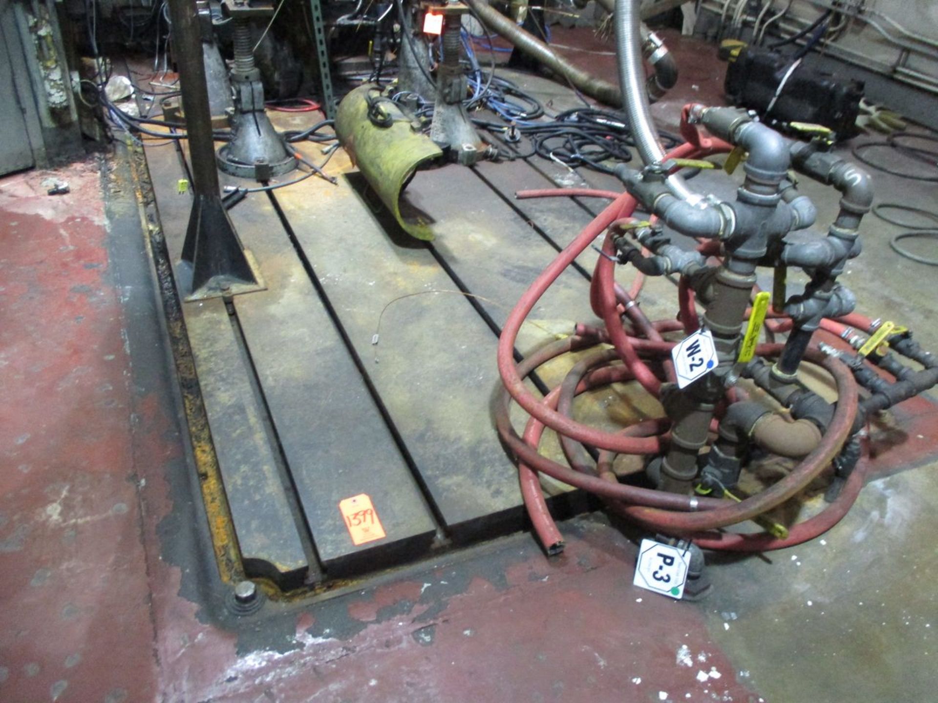 Contents of Cell 18S including 6' x 14' T-Slot Floor Plate, (4) Screw Jacks, Fuel Pump, Exhaust