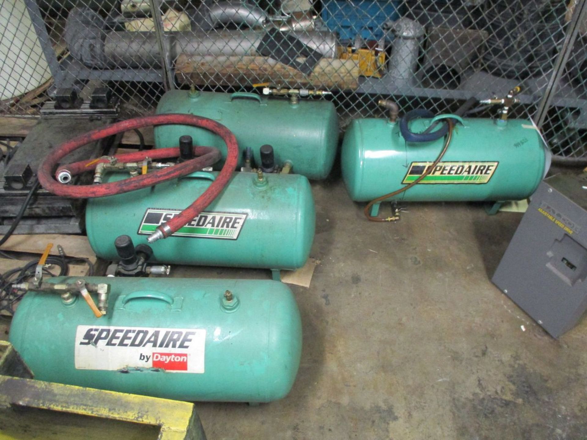 Contents of Cage 8 including (2) Speedair Portable Air Tank, (2) Portable Air Tank, Baldor