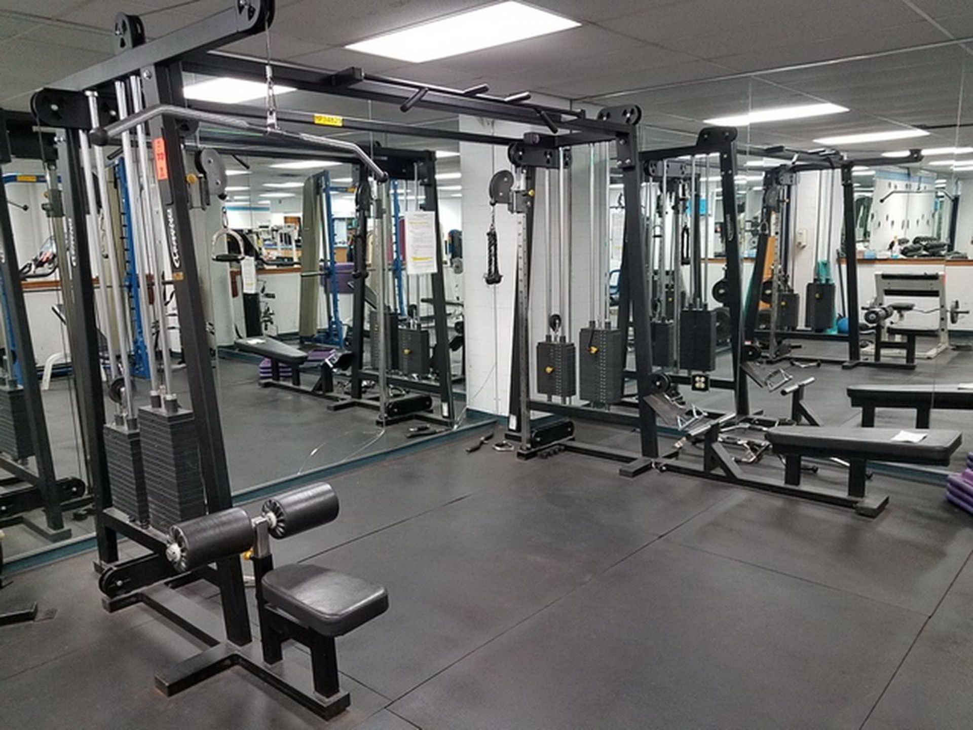 Legend Fitness Universal Workout Station, includes approx. 700 lbs. in plates total. A# 34825 Loc: