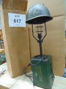 VERY UNUSUAL TABLE LAMP MADE FROM AMMO BOX AND COMBAT HELMENT C/W PLUG, LEAD AND FITTINGS