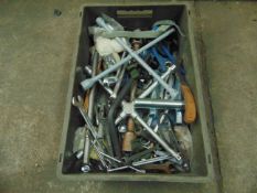 VARIOUS TOOLS AND ITEMS IN GREEN STORAGE BOX