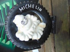 CAST IRON MICHELIN MAN SITTING IN TYRE 23 X 20cms