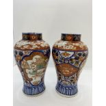 Pair of Imari baluster vases painted pagoda panels upon floral grounds, late 19thC (with Harrods
