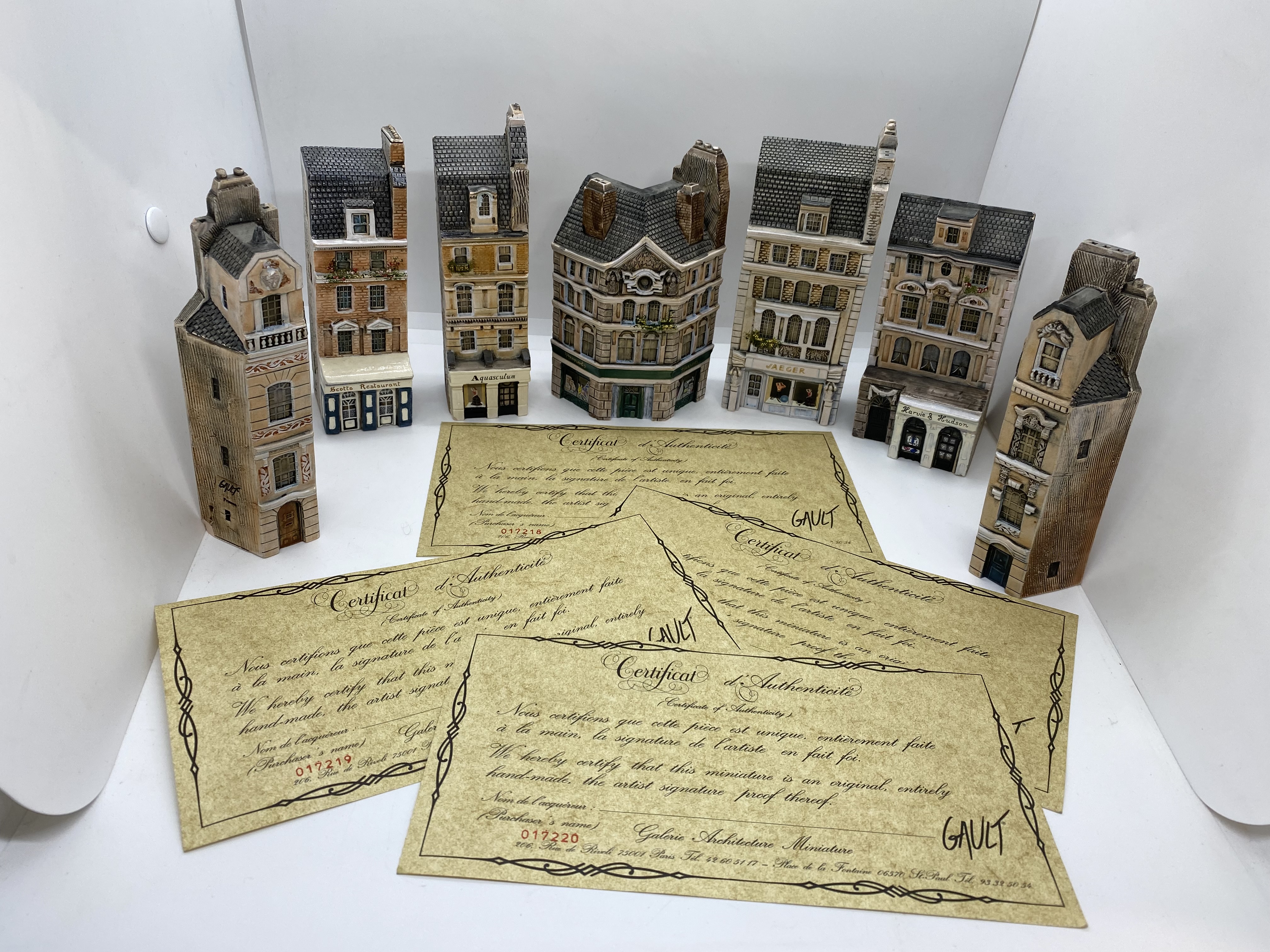 Seven pieces of hand made Gault architectural themed miniature ceramics; London House collection (