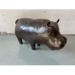 A leather clad hippo footstool/small seat/decorator's piece by Omersa, approx. 60cm long 25cm