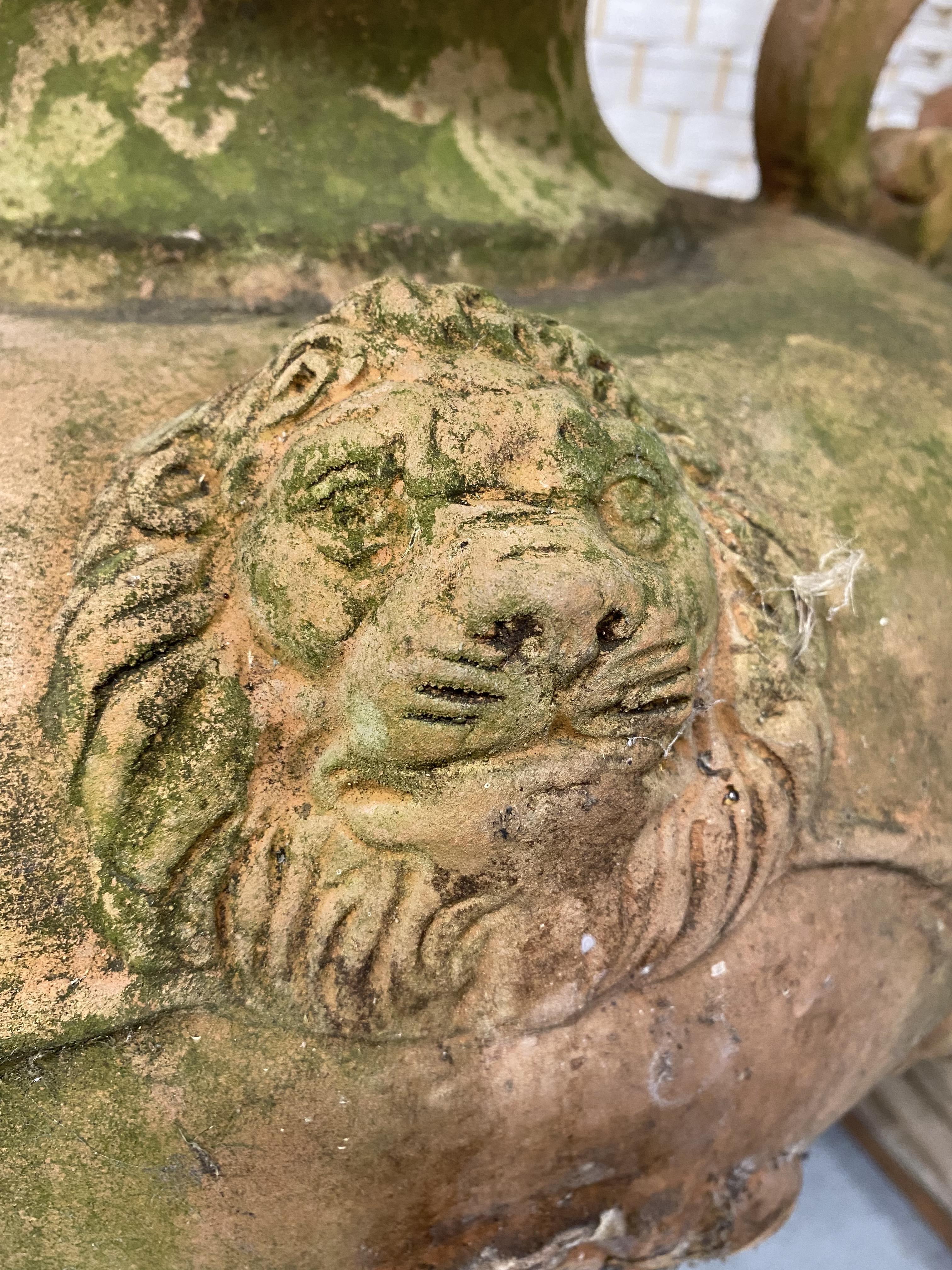 Two oversized Italian terracotta urns with twin handles, relief decorated with swags and lions. - Image 4 of 4