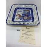 Antique Imari square dish with pierced flute brim, painted central panel of a basket of flowers on a
