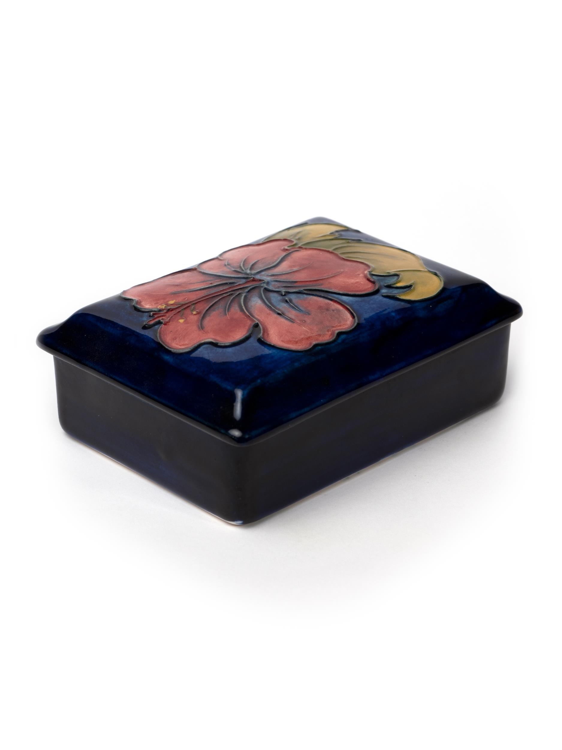 Moorcroft cobalt blue lidded rectangular dish with Hibiscus design to lid, Impressed Moorcroft to