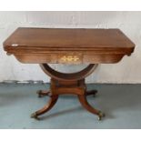 A Regency rosewood and satinwood banded folding card table with brass inlaid detailing c.1810,
