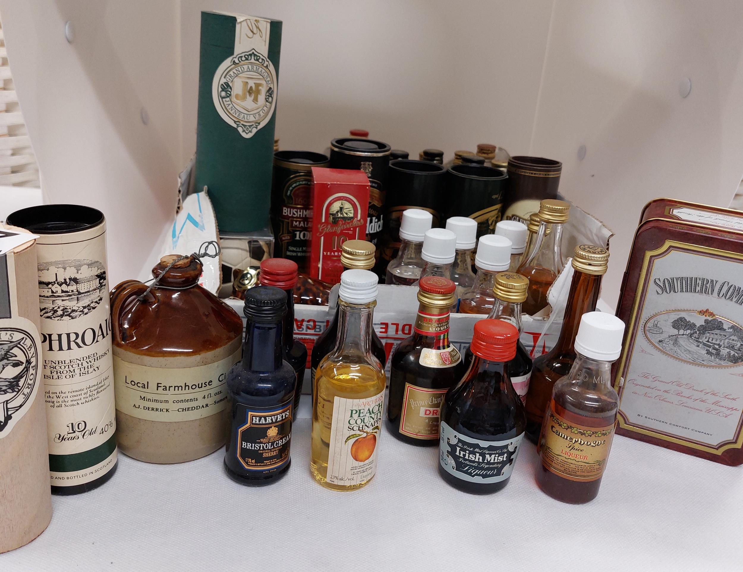 A collection of miniatures including whiskies, port, spirits, liqueurs etc A/F