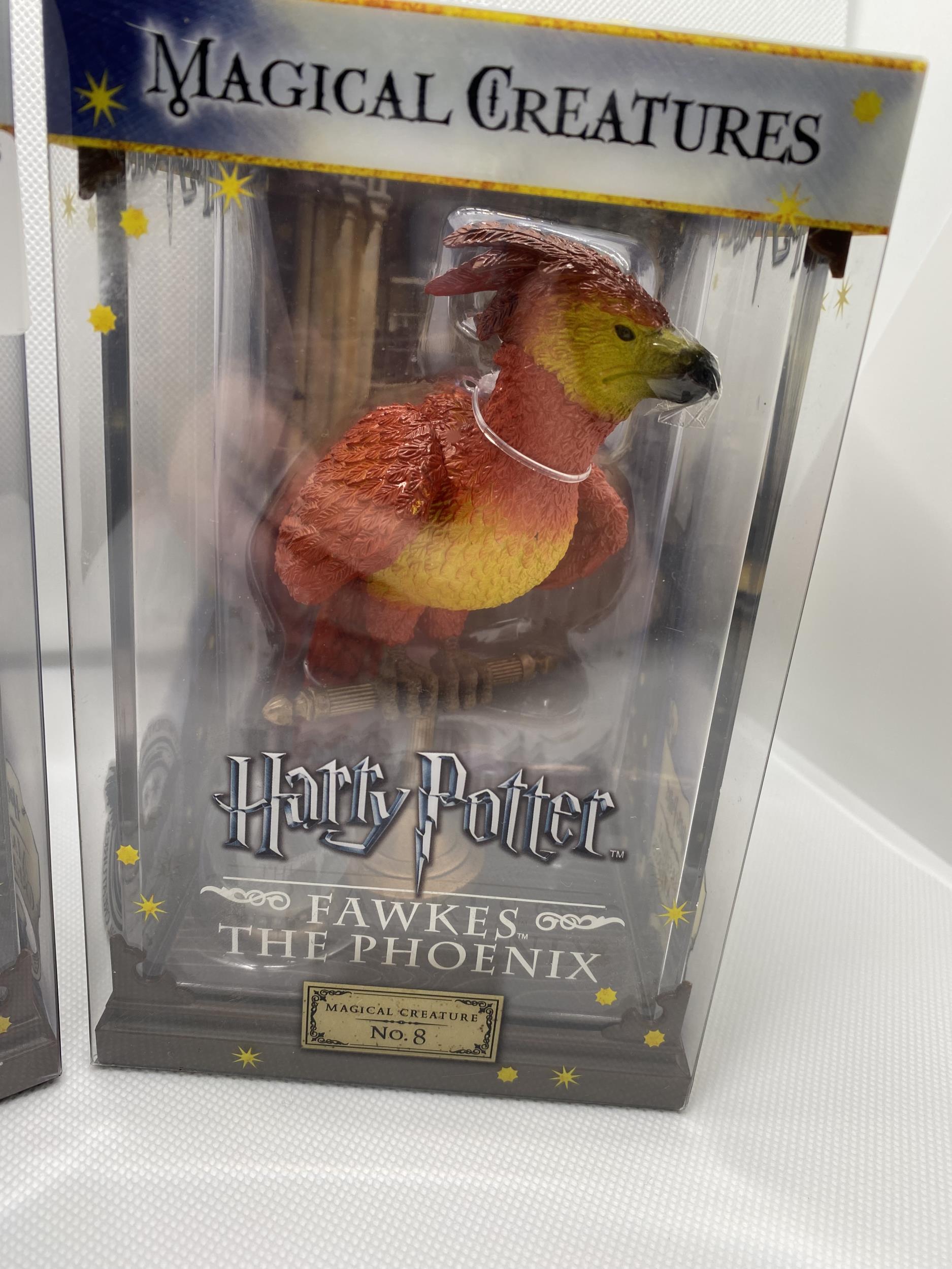 Two boxed Warner Brothers Harry Potter Magical Creatures figures no.2 ‘Dobby’ and no.8 'Fawkes the - Image 2 of 5