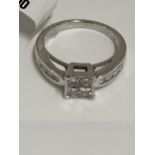 18ct white gold diamond ring, approx size 0.60cts of diamond in a square design with diamonds to