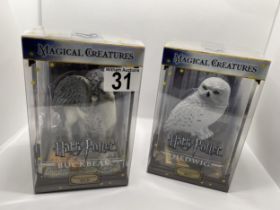 Two boxed Warner Brothers Harry Potter Magical Creatures figures no.1 ‘Hedwig’ and no.6 ‘Buckbeak’