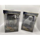 Two boxed Warner Brothers Harry Potter Magical Creatures figures no.1 ‘Hedwig’ and no.6 ‘Buckbeak’