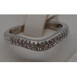 Platinum and diamond ring featuring a double row of diamonds, approx 0.30ct, approx size M.