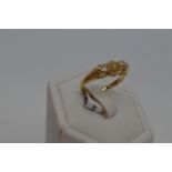 18ct yellow diamond ring, featuring three stones approx total 0.80ct, hallmarked 750 London,