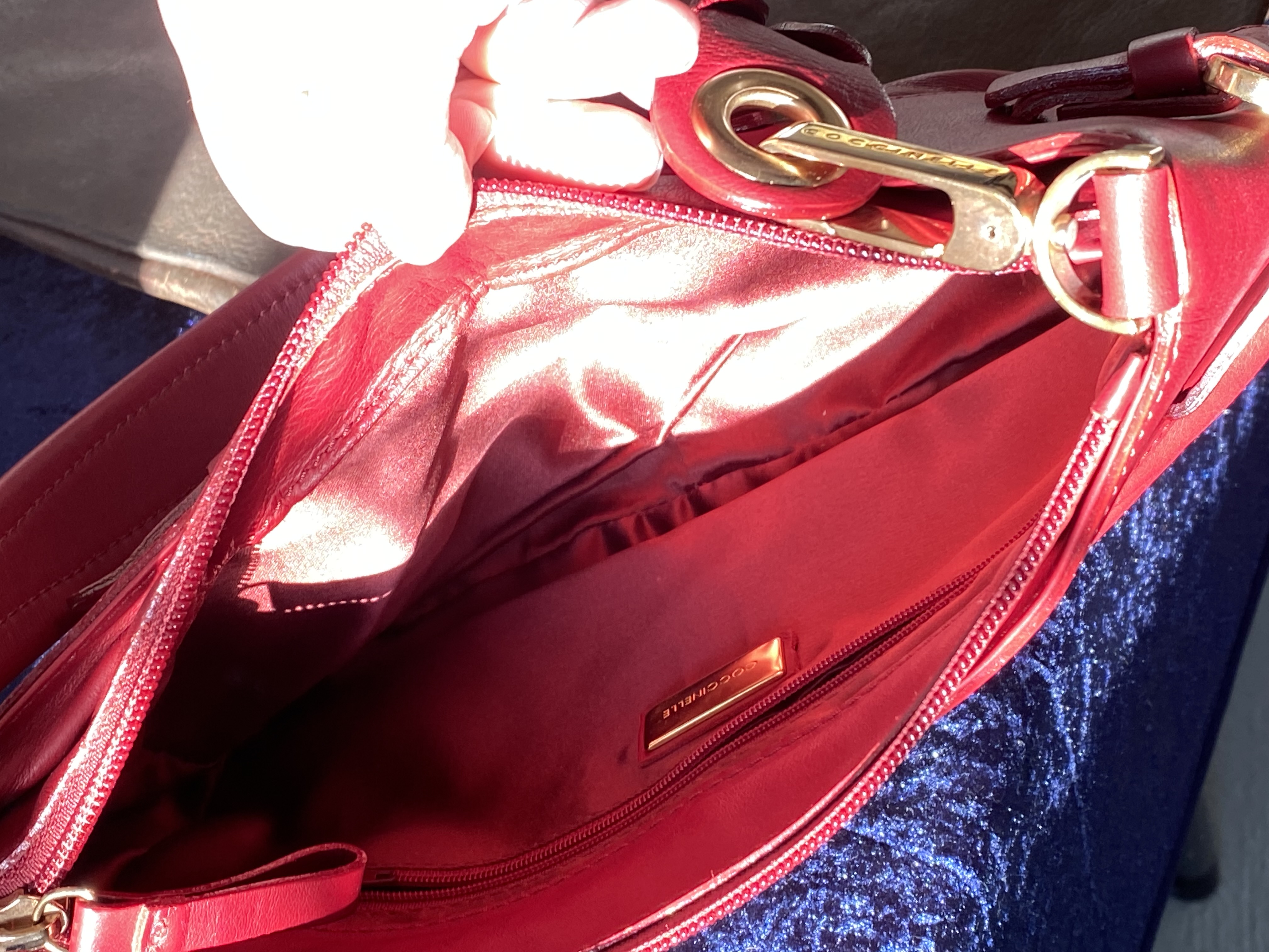 A genuine Coccinelle leather handbag featuring a striking red soft leather with contrasting gold - Image 6 of 6