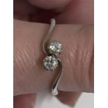 18ct white gold 0.30ct twin set diamond ring, hallmarked 750 London. Approx size o, This item has
