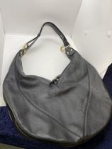 Genuine designer shoulder/handbag by Gretchen ‘The Little Pearl’ black leather with gold tone