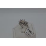 18ct white gold approx 1.10ct diamond cluster ring, Radiating oval splayed cluster design from