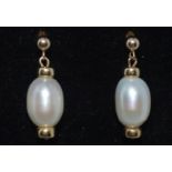 A pair of bespoke 9ct yellow gold pearl stud drop earrings, unmarked tested as 9ct gold, gross